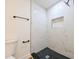 Modern bathroom with marble shower and hexagon tile floor at 3522 E 26Th Ave, Tampa, FL 33605