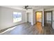 Spacious bedroom with an en-suite bathroom and large window at 3522 E 26Th Ave, Tampa, FL 33605