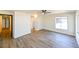 Bright bedroom with vinyl plank flooring and ceiling fan at 3522 E 26Th Ave, Tampa, FL 33605
