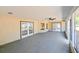 Spacious screened porch with double French doors at 3522 E 26Th Ave, Tampa, FL 33605