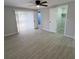 Bright bedroom with tile floors and sliding glass doors at 3546 Cheswick Dr, Holiday, FL 34691