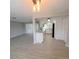 Open concept dining area with wood-look tile flooring at 3546 Cheswick Dr, Holiday, FL 34691
