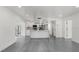 Modern kitchen with white cabinets and island at 3811 River Grove Ct, Tampa, FL 33610