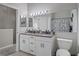 Double vanity bathroom with granite countertop at 388 Countryside Key Blvd, Oldsmar, FL 34677