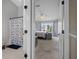 Main bedroom with water view and comfortable seating at 388 Countryside Key Blvd, Oldsmar, FL 34677