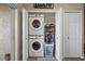 Stackable washer and dryer in a laundry closet at 388 Countryside Key Blvd, Oldsmar, FL 34677