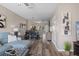 Open living and dining area with wood-look floors and light decor at 388 Countryside Key Blvd, Oldsmar, FL 34677