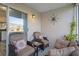 Cozy screened patio with wicker furniture at 388 Countryside Key Blvd, Oldsmar, FL 34677