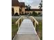 Wooden footbridge leading to building at 401 Dorchester Pl # 62, Sun City Center, FL 33573