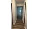 Clean hallway with wood-look floors at 401 Dorchester Pl # 62, Sun City Center, FL 33573