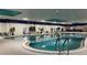 Indoor community pool with seating and ample space at 401 Dorchester Pl # 62, Sun City Center, FL 33573