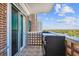 Private balcony with patio furniture and scenic city views at 4015 Bayshore Blvd # 9D, Tampa, FL 33611