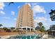 High-rise building with pool and lush landscaping at 4015 Bayshore Blvd # 9D, Tampa, FL 33611
