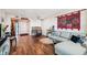 Living room with L-shaped sofa and wood flooring at 4015 Bayshore Blvd # 9D, Tampa, FL 33611