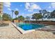 Refreshing community pool with surrounding patio at 4015 Bayshore Blvd # 9D, Tampa, FL 33611