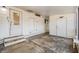 Enclosed patio with tiled floor and exterior access at 4711 Olive Dr, Zephyrhills, FL 33542