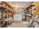 Laundry room with washer, dryer and ample storage at 4711 Olive Dr, Zephyrhills, FL 33542