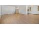 Living room with light wood flooring and open concept design at 4711 Olive Dr, Zephyrhills, FL 33542