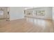 Spacious living room featuring light wood flooring at 4711 Olive Dr, Zephyrhills, FL 33542
