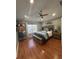 Spacious main bedroom with wood floors and a ceiling fan at 4754 Pond Ridge Dr, Riverview, FL 33578