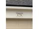 Close-up of house number 4754 on garage at 4754 Pond Ridge Dr, Riverview, FL 33578