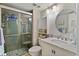 Clean bathroom, featuring a walk-in shower and marble vanity at 5151 Isla Key S Blvd # 223, St Petersburg, FL 33715