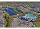 Aerial view showing community pool and lake at 5658 Del Coronado Dr, Apollo Beach, FL 33572