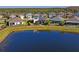 Aerial view of houses near a lake at 5658 Del Coronado Dr, Apollo Beach, FL 33572