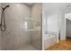 Spa-like bathroom with soaking tub and walk-in shower at 5658 Del Coronado Dr, Apollo Beach, FL 33572