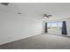 Bedroom with ceiling fan and lake view at 5658 Del Coronado Dr, Apollo Beach, FL 33572