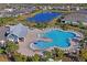 Resort-style community pool with plenty of lounge chairs at 5658 Del Coronado Dr, Apollo Beach, FL 33572