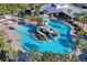 Aerial view of community pool with waterslide at 5658 Del Coronado Dr, Apollo Beach, FL 33572