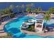 Relaxing community pool with waterslide and lounge chairs at 5658 Del Coronado Dr, Apollo Beach, FL 33572