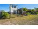 Back exterior of house with fenced yard at 5658 Del Coronado Dr, Apollo Beach, FL 33572