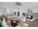 Open concept kitchen with island and white cabinets at 5658 Del Coronado Dr, Apollo Beach, FL 33572