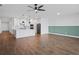 Modern kitchen with white cabinets and a large island at 5658 Del Coronado Dr, Apollo Beach, FL 33572