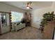 Charming bedroom with a full-size bed and window at 5730 16Th Ne Ln, St Petersburg, FL 33703