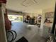 Attached garage with washer, dryer, and storage at 5730 16Th Ne Ln, St Petersburg, FL 33703