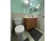 Clean bathroom with updated vanity and toilet at 5895 18Th N St # 9, St Petersburg, FL 33714
