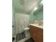 Clean bathroom with updated vanity and shower at 5895 18Th N St # 9, St Petersburg, FL 33714