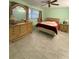 Bright bedroom with tiled floors and ceiling fan at 5895 18Th N St # 9, St Petersburg, FL 33714