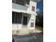 Condo building exterior, showing entrance and landscaping at 5895 18Th N St # 9, St Petersburg, FL 33714
