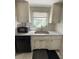 Kitchen with granite countertops and light wood cabinets at 5895 18Th N St # 9, St Petersburg, FL 33714