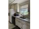 Kitchen with granite countertops and light wood cabinets at 5895 18Th N St # 9, St Petersburg, FL 33714