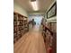 Well-lit community library with ample bookshelves and seating at 5895 18Th N St # 9, St Petersburg, FL 33714
