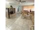 Bright living room with tiled floors, comfy sofas, and a coffee table at 5895 18Th N St # 9, St Petersburg, FL 33714