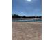 Community pool with plenty of deck space for lounging at 5895 18Th N St # 9, St Petersburg, FL 33714