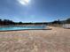 Community pool with plenty of deck space for lounging at 5895 18Th N St # 9, St Petersburg, FL 33714