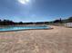Community pool with plenty of deck space for lounging at 5895 18Th N St # 9, St Petersburg, FL 33714