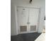 Exterior double doors leading to a shared trash area at 5895 18Th N St # 9, St Petersburg, FL 33714